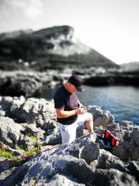 Man standing on rock formation