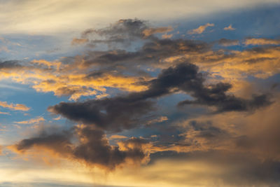 Low angle view of dramatic sky during sunset