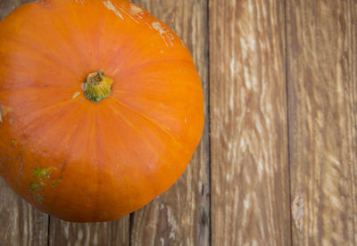 Directly above shot of orange pumpkin on table