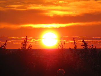 Scenic view of landscape at sunset