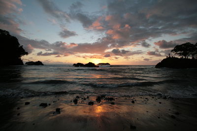 View of beach at sunset