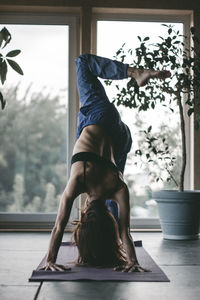 Woman exercising at home