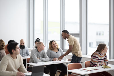 Teacher and adult students in class