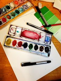 High angle view of multi colored pencils on table