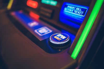 Close-up of illuminated slot machine