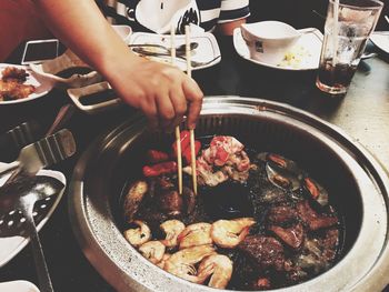 Close-up of man eating food