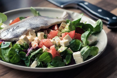 Close-up of salad in plate on table