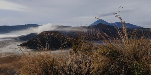 Panoramic view of volcanic mountain against sky