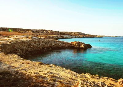 Scenic view of sea against clear sky