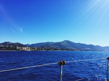 Scenic view of sea with mountains in background