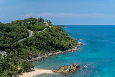 Landscape part of tripical island deep blue waves ocean and clear summer sky seascape as background