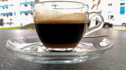 Close-up of coffee in cup on table