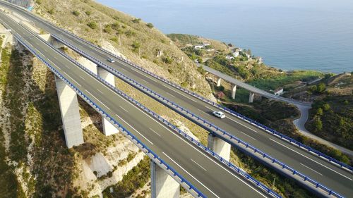 High angle view of trees and sea against sky