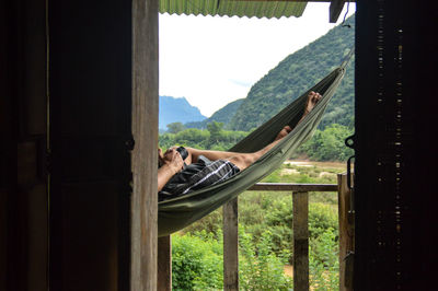 Man relaxing on a hammock