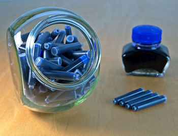 High angle view of bottles on table