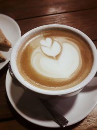 Close-up of cappuccino on table