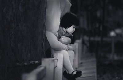 Boy sitting on floor