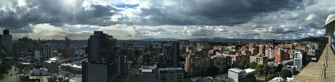 Panoramic view of city against sky