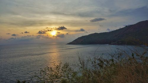 Scenic view of sea against sky during sunset