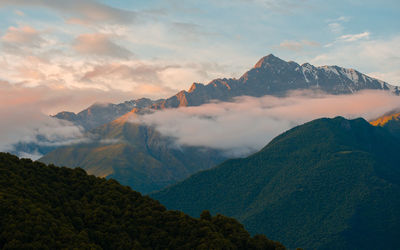 Scenic view of mountains against sky during sunset