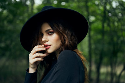 Portrait of young woman looking away