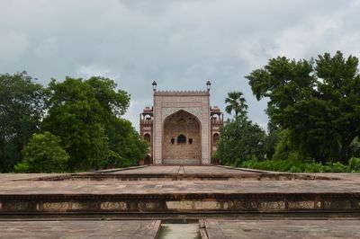 View of gateway against cloudy sky