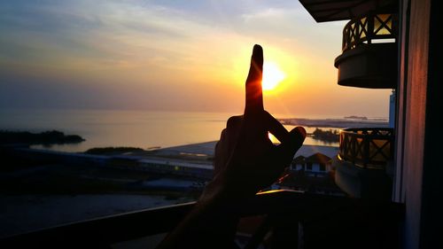 Scenic view of sea at sunset