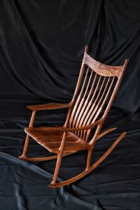 High angle view of empty chair on table