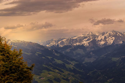 Scenic view of mountains against sky during sunset