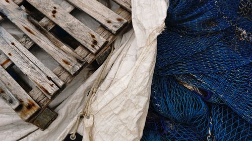 Background of fishing net, canvas and pallet