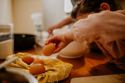 Side view of boy eating food