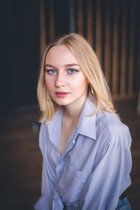 Portrait of young woman with blond hair