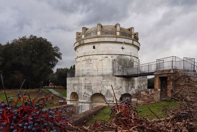 Low angle view of old ruins against sky