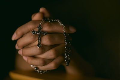 Close-up of woman holding hands