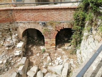 Low angle view of arch bridge on wall