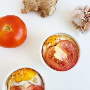 High angle view of tomatoes in plate on table