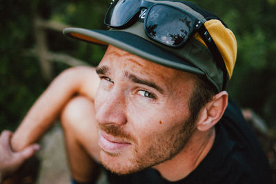 Close-up portrait of young man wearing sunglasses