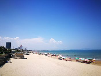 Scenic view of sea against blue sky