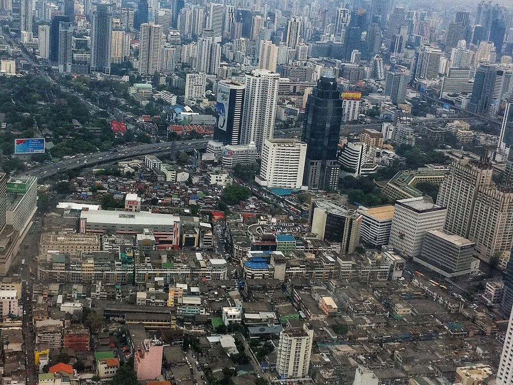 HIGH ANGLE VIEW OF MODERN CITY BUILDINGS