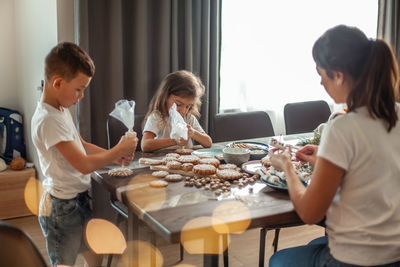 Women and food on table