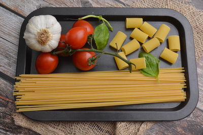 High angle view of vegetables on cutting board