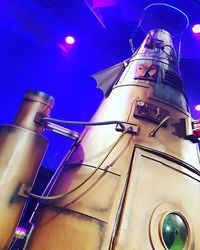 Low angle view of tree against blue sky