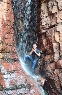 Woman jumping in water