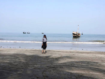 Beautiful young girl on the beach at saint martin island, bangladesh