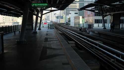 Railroad station platform in city