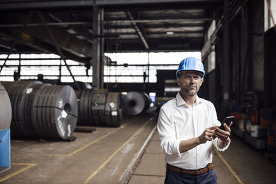 Portrait of man working in bus