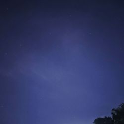 Low angle view of blue sky at night