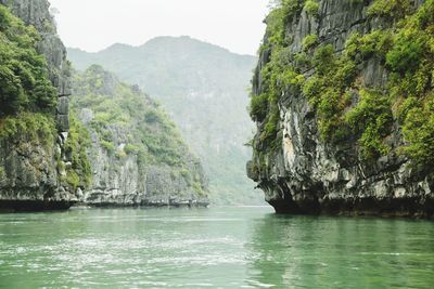 Scenic view of river against mountains