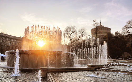 Fountain in city during winter