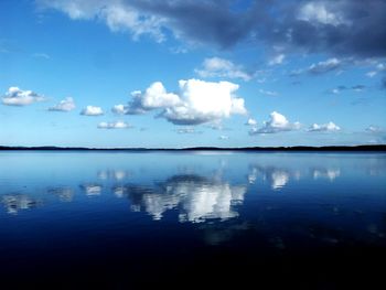 Scenic view of landscape against blue sky